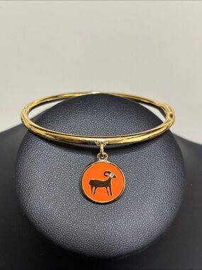Kate spade Aries Charm Horoscope She Piques Their Curiosity Gold Bangle Bracelet